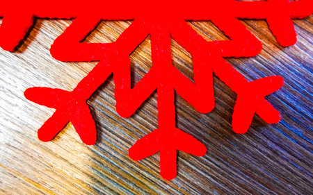 Red Christmas and winter decoration stars and snowflakes in Eckernfeld Lehe Bremerhaven Bremen Germany.の写真素材