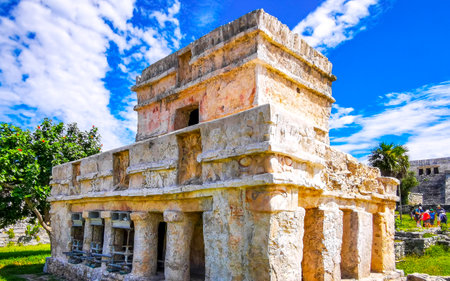Tulum Quintana Roo Mexico October 20, 2023 Ancient Tulum ruins Mayan site with the temple of the frescoes in the tropical natural jungle palm trees landscape panorama view in Tulum Mexico.の写真素材