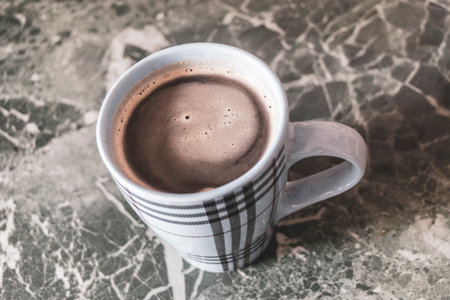 Coffee cup mug on marble table background in Leninskiy Rayon Brest Brest District Brest Region Belarus.の写真素材
