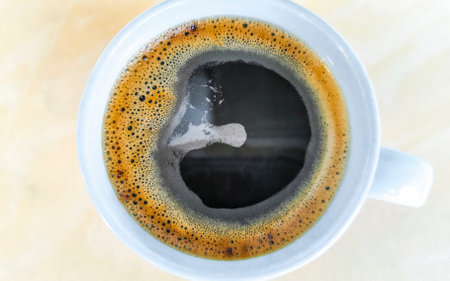 Coffee cup mug on marble table background.の写真素材