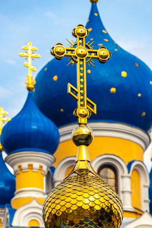 Brest Brest Region Belarus September 26, 2020 Blue onion dome and yellow gold golden cross on famous Saint Nicholas church cathedral in Leninskiy Rayon Brest Brest District Belarus.の写真素材
