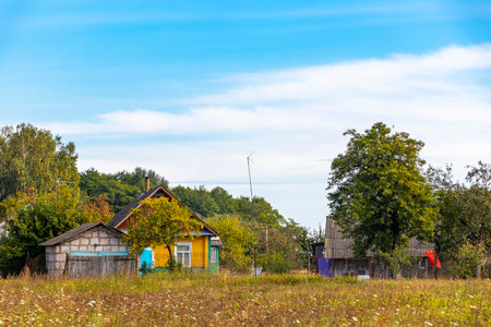 Mir Karelichy Region Belarus September 29, 2020 Typical Colorful Village Streets and Paths with Wooden Huts Cabins and Houses in Mir Karelichy District Hrodna Region Belarus.の写真素材