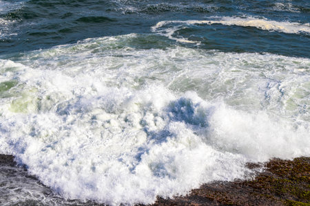 Ipanema Beach with Blue Turquoise Water Waves Sea and Boulders Rock Rocks in Rio de Janeiro State of...