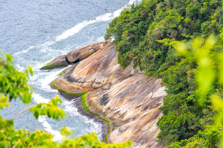 Tropical Paradise with Blue Turquoise Water, Hills, Mountains, and Rocks in Rio de Janeiro, Brazil.の写真素材