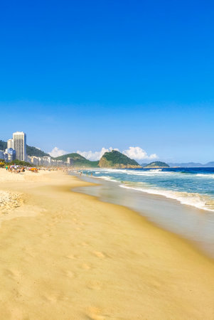 Rio de Janeiro State of Rio de Janeiro Brazil October 20, 2020 Copacabana and Leme Beach Tropical Paradise with Waves Sand People Tourism Parasols and sun loungers in Brazil.の写真素材