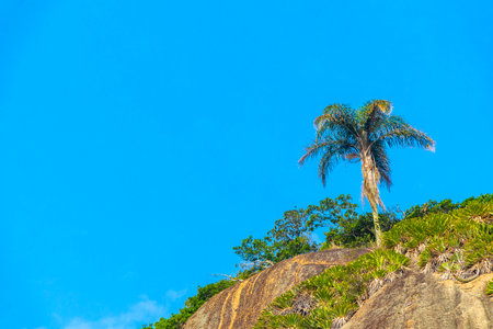 Mountain Mountains Hill Hills Rock Rocks and Blue Cloudy Sky Landscape Panorama in Rio de Janeiro State of Rio de Janeiro Brazil.の写真素材