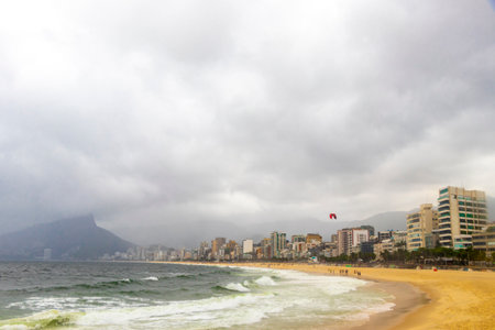 Rio de Janeiro State of Rio de Janeiro Brazil 10. October 2010 Ipanema Beach Tropical Paradise with Two Brothers Hill Blue Turquoise Water and Dark Storm Rain Clouds in Brazil.の写真素材