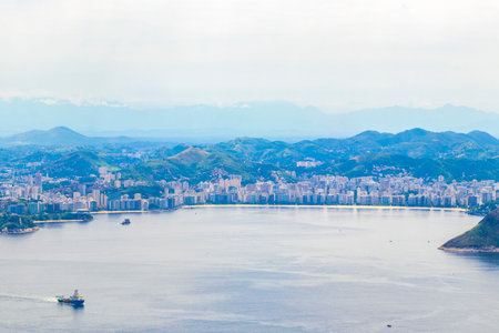 Rio de Janeiro Panorama View of the City Skyline Beaches Beach Coast Sea Mountains Tropical Forest and Blue Cloudy Sky in State of Rio de Janeiro Brazil.の写真素材