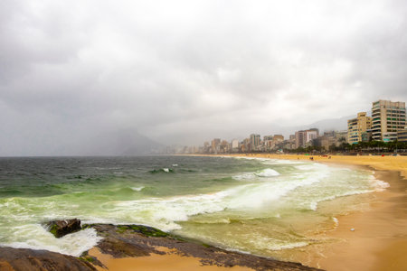 Rio de Janeiro Brazil 10. October 2010 Ipanema Beach with Two Brothers Hill Blue Turquoise Water and Dark Storm Rain Clouds in Brazil.の写真素材