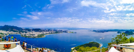 Rio de Janeiro Panorama View of the City Skyline Beaches Beach Coast Sea Mountains Tropical Forest and Blue Cloudy Sky in State of Rio de Janeiro Brazil.の写真素材