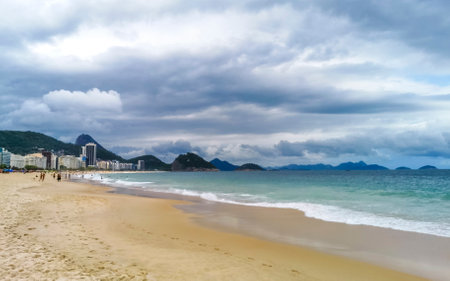 Rio de Janeiro State of Rio de Janeiro Brazil 10. October 2020 Copacabana and Leme Beach Tropical Paradise with Waves Sand People Tourism Parasols and sun loungers in Brazil.の写真素材