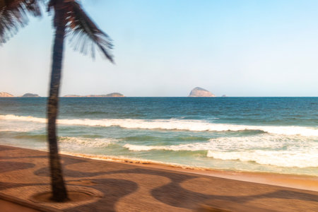 Barra da Tijuca Beach Tropical Paradise with Blue Turquoise Water Waves Rocks Hills and Islands in Rio de Janeiro State of Rio de Janeiro Brazil.の写真素材