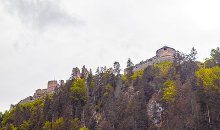 Ehrenberg Castle and Highline suspension bridge on a hill and cloudy sky in the Alps Reutte Tyrol Austria.の写真素材
