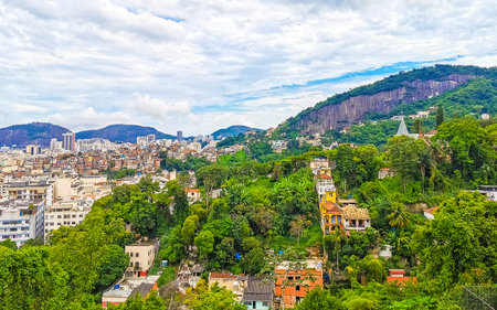 Rio de Janeiro State of Rio de Janeiro Brazil December 08, 2020 City Town Cityscape and Skyline Panorama with Old Houses Buildings Mountain and Blue Cloudy Sky in Brazil.の写真素材