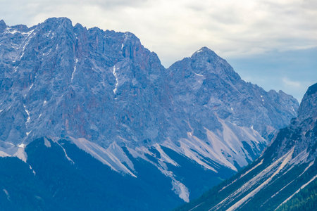 Cold panoramic view of Germanys largest mountain Zugspitze peak alpine landscape with snow rocks...