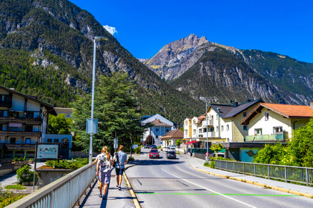Landeck Landeck District Tyrol Austria May 30, 2025 Landeck city town with tourist streets roads people modern buildings and cars and traffic.の写真素材