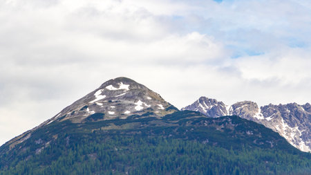 Panoramic view of Marienberg mountain at Zugspitze alpine landscape with green forest rocks hills and mountains in the Alps Biberwier Reutte Tyrol Austria.の写真素材