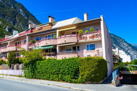 Landeck Landeck District Tyrol Austria May 30, 2025 Landeck city town with tourist streets roads people modern buildings and cars and traffic.の写真素材