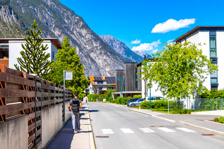 Landeck Landeck District Tyrol Austria May 30, 2025 Landeck city town with tourist streets roads people modern buildings and cars and traffic.の写真素材