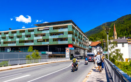 Landeck Landeck District Tyrol Austria May 30, 2025 Landeck city town with tourist streets roads people modern buildings and cars and traffic.の写真素材