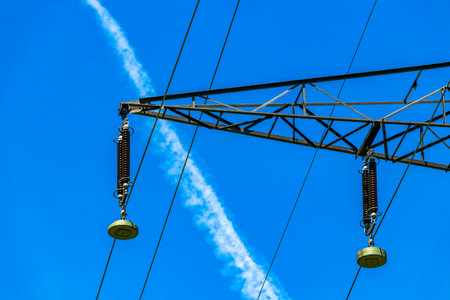 Large electricity pylon power pole with blue sky in the Alps Fliess Landeck Tyrol Austria.の写真素材