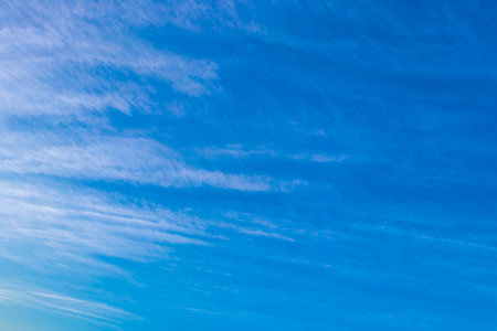 Blue and cloudy sky with sunshine.の写真素材