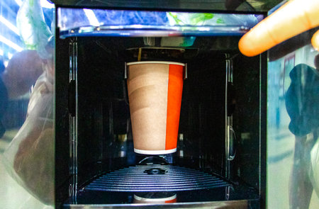 Brest Brest Region Belarus September 22, 2020 Get coffee to go take away from a vending machine in Leninskiy Rayon Belarus.の写真素材