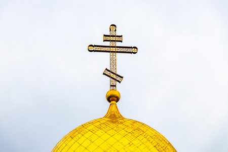 The temple of the Icon of the Mother of God church cathedral building with golden dome and cross in...