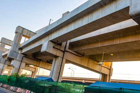 Don Mueang Bangkok Thailand January 27, 2020 Street road highway motorway over bridge with busy city life people buildings cars heavy traffic jam rush hour in Bangkok Central Thailand Asia.の写真素材