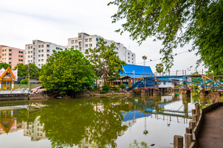 Village town house houses and life along the Prem Prachakon canal and river in Don Mueang Bangkok Central Thailand in Southeastasia Asia.の写真素材