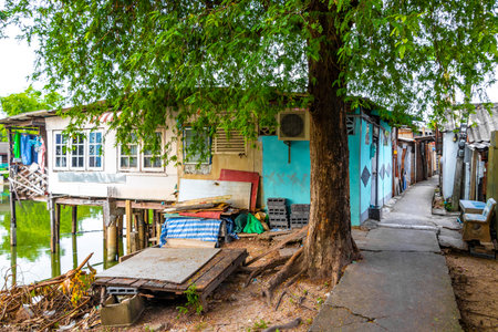 Don Mueang Bangkok Thailand November 7, 2018 Village town house houses and life along the Prem Prachakon canal and river in Don Mueang Bangkok Central Thailand.の写真素材