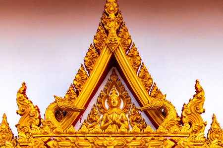 Khon Kaen District Isan Thailand November 06, 2018 Phra Mahathat Kaen Nakhon pagoda style golden buddhist temple Wat Nong Waeng details decoration art in Khon Kaen Isan Thailand.の写真素材