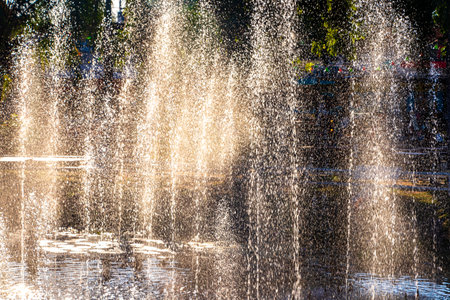 Ton Tann Green Market Thai night street food park with beautiful fountain fountains and pond water in Khon Kaen District Khon Kaen Province Isan Northeast Thailand.の写真素材