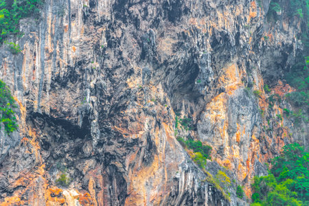 Tropical limestone islands rock wall boulder cliff texture pattern in Krasom Amphoe Takua Thung District Phang Nga Province Southern Thailand in Southeast Asia.の写真素材