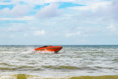 Kathu Phuket Thailand October 10, 2025 Speed boat yacht tourist boats in turquoise blue water at the beach in Patong Beach Phuket Island Province Southern Thailand in Southeast Asia.の写真素材