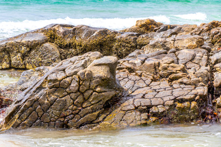 Amazing beach tropical landscape panorama view with turquoise blue water waves and rocks in Patong...