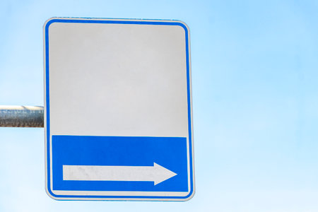 Evacuation route surfboard and arrow beach direction sign signs in Patong Beach Kathu Phuket Island Southern Thailand in Southeast Asia.の写真素材