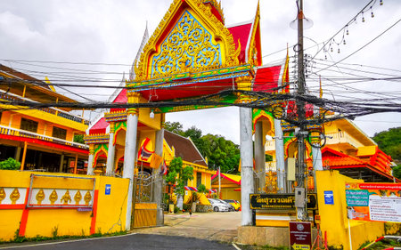 Kathu District Phuket Island Province Thailand October 9th 2025 Welcome gate door entrance to the Suwankeereewong Temple wat golden Buddhist temples in Patong Beach Phuket Island Southern Thailand.の写真素材
