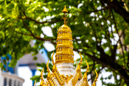 Kathu District Phuket Island Province Thailand October 08, 2025 Holy beautiful yellow white golden Thai spirit ghost house in Patong Beach Kathu District Phuket Island Province Southern Thailand.の写真素材