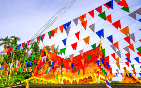 Kathu District Phuket Island Province Thailand October 26, 2025 Suwankeereewong Temple wat golden Buddhist temples buildings panorama with blue cloudy sky in Patong Beach Phuket Island Thailand.の写真素材