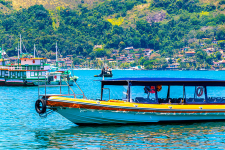 Angra dos Reis State of Rio de Janeiro Brazil October 28, 2020 Panorama of tropical coast beach seascape with turquoise green blue water pier port harbor with ships yachts and boats.の写真素材