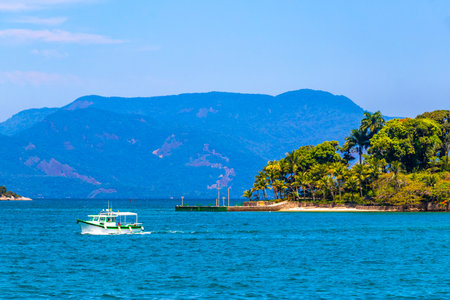 Angra dos Reis State of Rio de Janeiro Brazil October 28, 2020 Panorama of tropical islands island coast beach seascape with turquoise green blue water mountains and pier port with boats in Brazil.の写真素材