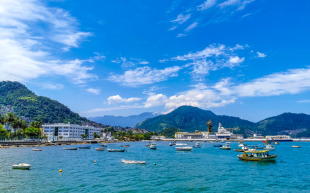 Angra dos Reis State of Rio de Janeiro Brazil October 27, 2020 Panorama of tropical coast beach seascape with turquoise green blue water pier port harbor with ships yachts and boats.の写真素材