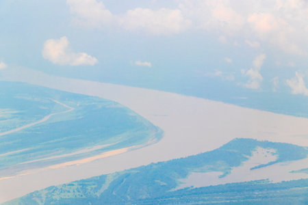 Flight in plane with aerial panorama view to Amazon river Rio negro tropical jungle rainforest of State of Amazonas Brazil.の写真素材