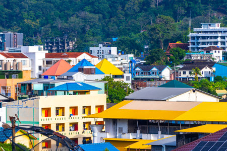 Panoramic view and panorama of tropical landscape mountains city skyline cityscape jungle forest and nature with blue sky in Patong Beach Kathu Phuket Island Province Thailand in Southeast Asia.の写真素材
