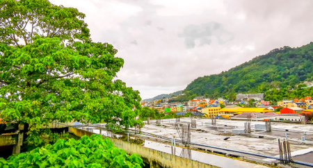 Panoramic view and panorama of tropical landscape mountains city skyline cityscape jungle forest and nature with blue sky in Southeast Asia.の写真素材