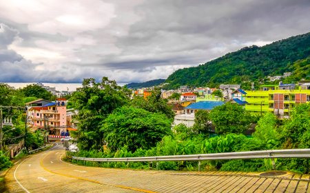 Panoramic view and panorama of tropical landscape mountains city and beach with blue sky in Kathu District Phuket Island Province Southern Thailand in Southeast Asia.の写真素材