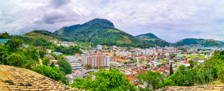 Mountain city town sea and tropical landscape panorama view.の写真素材
