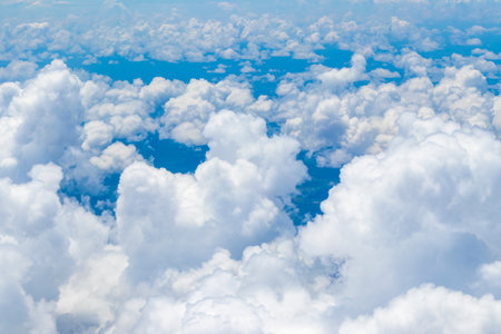 Aerial view of clouds and sky from an airplane.