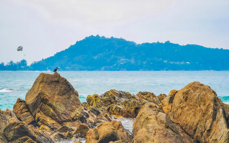 Amazing rocky tropical landscape panorama view with blue sky turquoise water waves and rocks in Province Southern Thailand in Southeast Asia.の写真素材